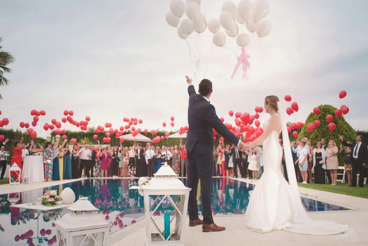 Couple with balloons at the reception