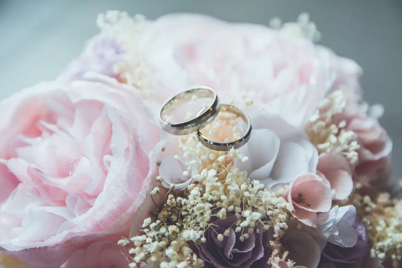 Wedding rings among flowers